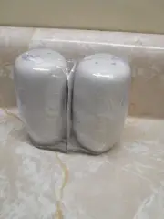 white ceramic salt and pepper shakers