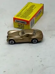 1996 MATCHBOX SUPERFAST #11 GOLD CHRYSLER ATLANTIC NEW IN BOX