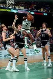 Nate "Tiny" Archibald Boston Celtics goes up for a shot against th- Old Photo