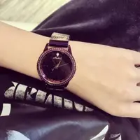 在飛比找ETMall東森購物網優惠-款紫色星空個性士鋼帶百搭手表女時尚圓形石英玫瑰普通國產腕表