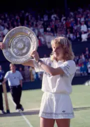 Steffi Graf of Germany lifts the trophy after defeating Martina N - Old Photo 7