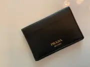Prada wallet unisex black leather