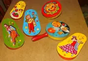 6 old Tin Litho Clackers / Noise Makers - Clown, Balloon Man, Mariachi Guitarist