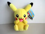 Pikachu Pokemon TOMY 2017 9" Plush Sitting Smiling Happy Excited Yellow Toy
