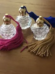 Three Cute mini perfume bottles with Tassels In Various Clear Glass Styles