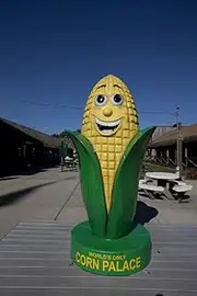 Ear of Corn Sculpture The original Corn Palace called The Corn Belt Exposition was established in 1892 Early settlers displayed the fruits of their harvest on the building exterior in order to prove t