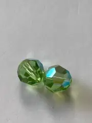 10 Swarovski Crystal Peridot 8mm Round. Free postage no tracking
