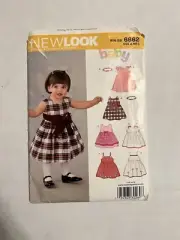 Sewing Pattern Dress NB S M L Baby 7 to 34 Lbs 4 Styles Overskirt Uncut NL 6662