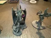 9 Pewter Statues , One If Which Is "The Studious Dragon"