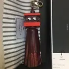 Anya Hindmarch Space Invaders Tassel Charm Bag