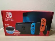 NEW Nintendo Switch 32GB w Blue and Red Joy-Cons, Carrying Case, 1 yr membership