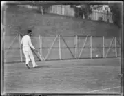 Japanese tennis player Jiro Sato walking along the baseline of a c- Old Photo