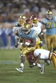 Running back Durrell Price California at Los Angeles Bruins tries - Old Photo