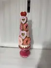 Bella Lux Valentine Donut Tree and a Heart Topper on a Pedestal