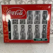 Coca-Cola Bottle 10 Piece Light Strand Light Set. Glitter. White Light. NEW