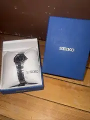 Seiko Quartz Ladies Silver & Black Watch Hardlex Crystal Brand New Mint