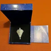 Swarovski Crystal year 2000 signed Christmas tree pin with box and booklet