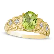 Oval Lab-Created Peridot and 0.05 CT. T.W. Diamond Quilted Ring in Solid 10K Yellow Gold