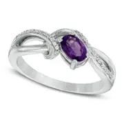 Oval Amethyst and 0.10 CT. T.W. Natural Diamond Split Shank Ring in Sterling Silver