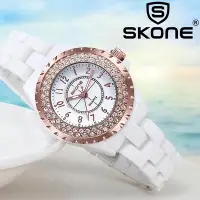 在飛比找Yahoo!奇摩拍賣優惠-Skone 著名品牌豪華石英手錶女士時尚陶瓷錶帶手錶鑽石石鐘