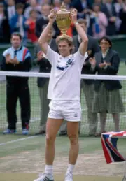 Stefan Edberg of Sweden lifts the trophy after defeating Boris Be - Old Photo 4
