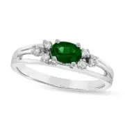 Sideways Oval Emerald and 0.10 CT. T.W. Natural Diamond Tri-Sides Split Shank Ring in Solid 14K White Gold