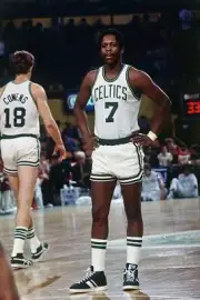 Nate "Tiny" Archibald Boston Celtics looks on during a game played- Old Photo