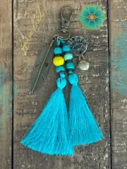 Keyring Tassel Feather, Charm, Brass Bell, Evil Eye and Handmade Beads