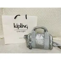 在飛比找蝦皮商城精選優惠-全新現貨❣️Kipling 璀璨星光銀輕巧圓筒手提肩背兩用包