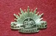 NEW RISING SUN HAT BADGE - GILT METAL ROYAL AUSTRALIAN ARMY CURRENT MODEL MINT