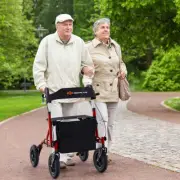 Costway Height Adjustable and Foldable Rollator Walker with Storage Bag-Red