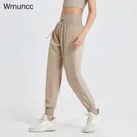 在飛比找蝦皮商城優惠-Wmuncc 女士寬鬆瑜伽運動褲彈性高腰跑步抽繩哈倫速乾健身