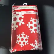 NIP Vinyl Tablecloth Snowflakes On Red Flocked Back Holiday Time