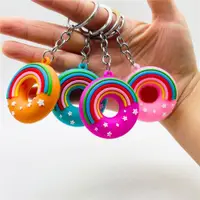 在飛比找ETMall東森購物網優惠-新款彩虹甜甜圈鑰匙扣雙面立體星空彩虹面包鑰匙圈掛件活動禮品