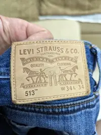 在飛比找Yahoo!奇摩拍賣優惠-Levi's 513 夏日薄料修身牛仔小直筒褲 34