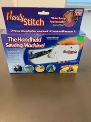 Handy Stitch Handheld Sewing Machine Uses 4 AA batteries (not included)
