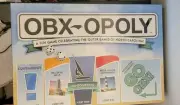 OBX- OPOLY BOARD GAME OUTER BANKS NC. NEW SEALED and COMPLETE. SHIPS FREE