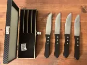 Set of 4 Unmarked Steak Knives 1.25” Wide 10” Long Knives W/ Black Handles