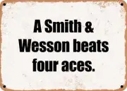 METAL SIGN - A Smith & Wesson beats four aces.