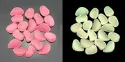 200 pcs Luminous Stone，Each About 1 inch，Absorb Sunlight for More Than 2 Hours and emit Light for 3-6 Hours，Used for bar Decoration; Villa Garden Landscaping, Swimming Pool Decoration, etc.(Pink)