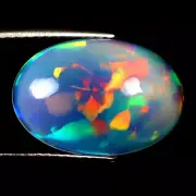 4.08 ct Excellent Oval Cabochon (16 x 11 mm) Ethiopian Flashing Rainbow Opal