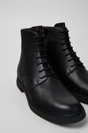 Iman Black leather lace-up boots for women
