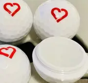 (2) ECCO White Golf Ball Globe Moisturizer With Red. Heart Chapstick Lip Balm