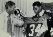 Minnesota Vikings coach Jerry Burns greets Herschel Walker of the - Old Photo