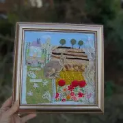 Hand Stitched Hare picture. Textile art hand embroidery.