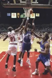 Forward Karl Malone Utah Jazz shoots the ball over guard Malik Sea- Old Photo