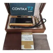 Contax T2 Gold 60th Anniversary Film Camera w/ wooden box, strap, manual—used