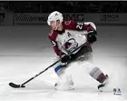 Nathan MacKinnon Colorado Avalanche Unsigned White Jersey Stop Spotlight Photo