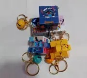 New set of 2 cartoon bell keychain puzzle cube random sent
