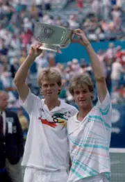Stefan Edberg and Anders Jarryd both of Sweden lift the trophy af - Old Photo